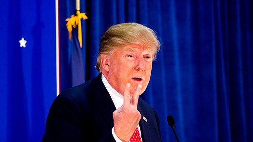 Donald Trump holding up two fingers.